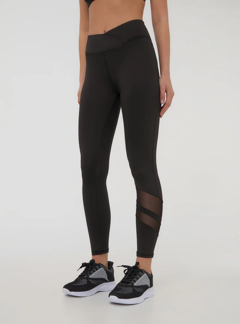 Leggings sportivi con inserto in tulle