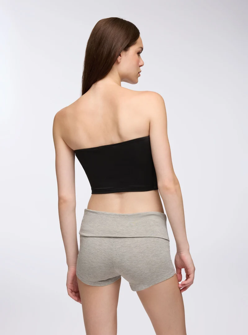 Culotte a vita alta con risvolto