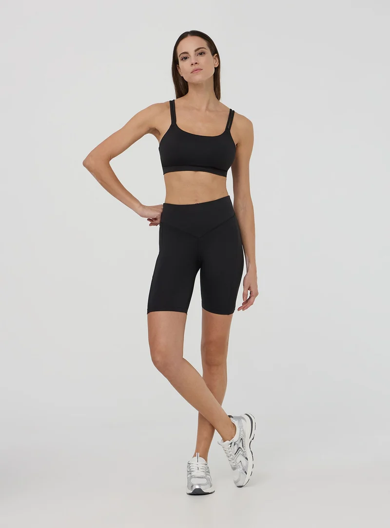 Leggings sportivi corti con tasca