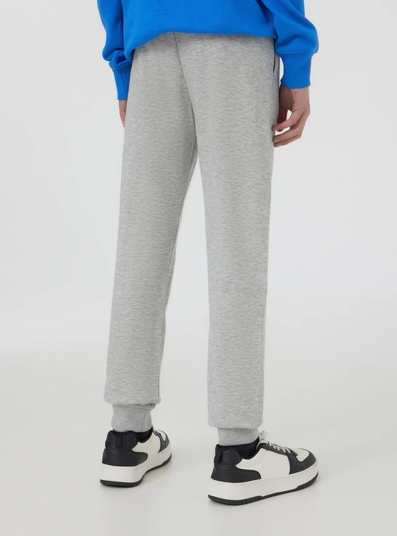 Pantaloni leggeri della tuta con stampa sportiva