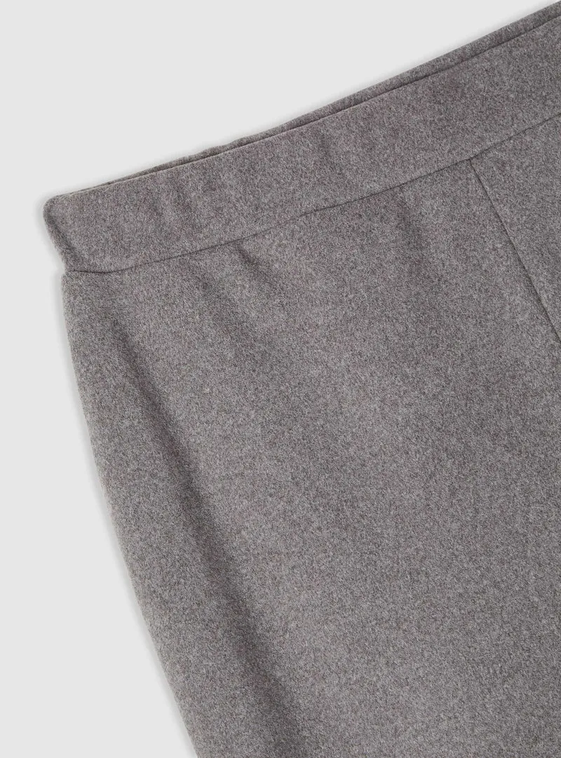 Pantaloni tuta a zampa tinta unita