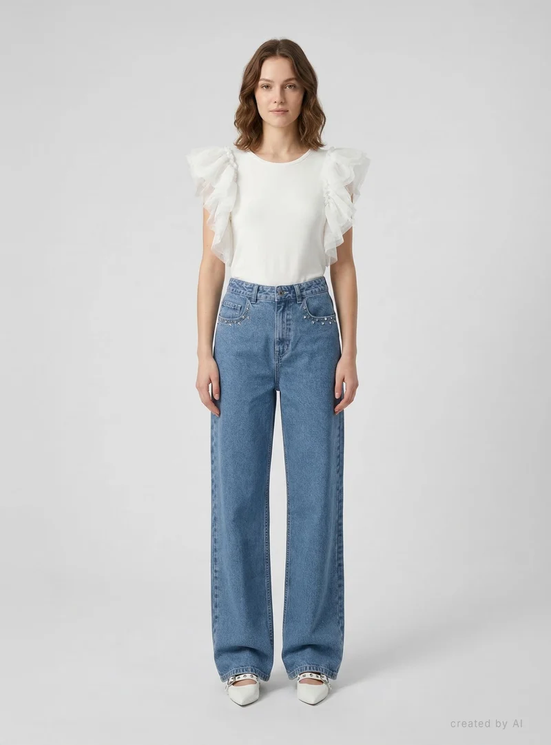 Jeans wide leg con strass tasche