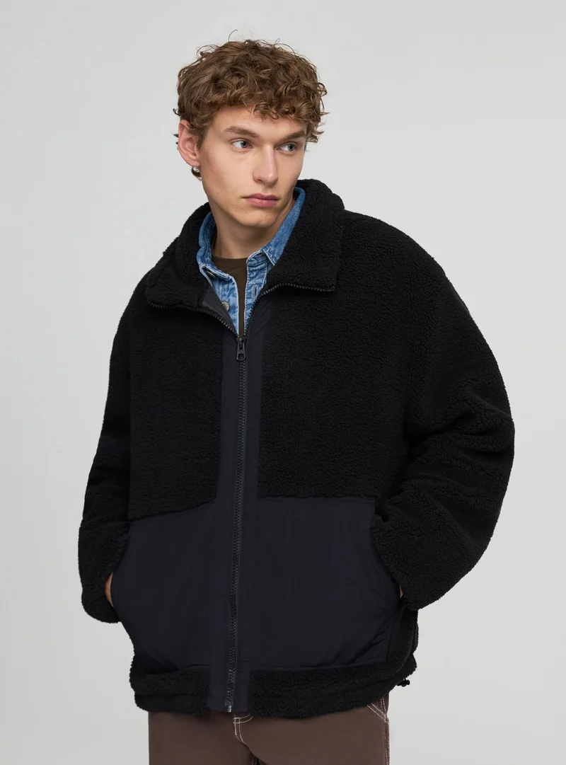 Giubbotto sherpa con zip