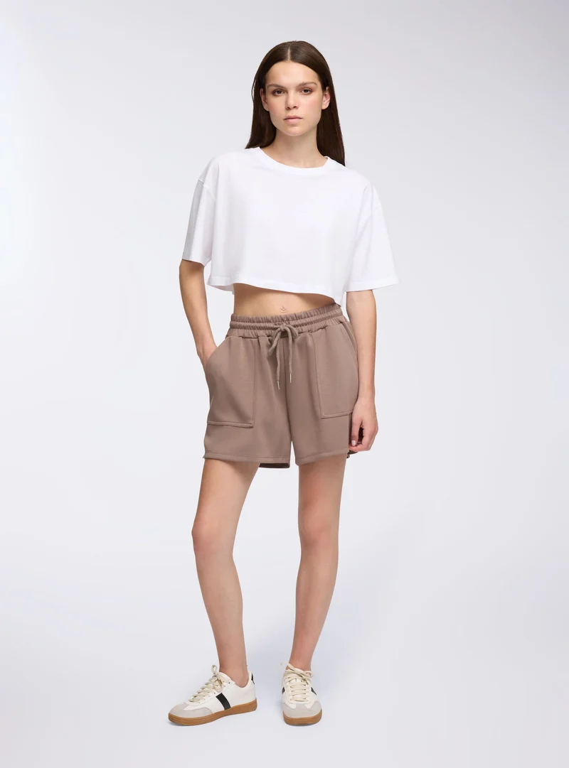 Bermuda tuta con coulisse