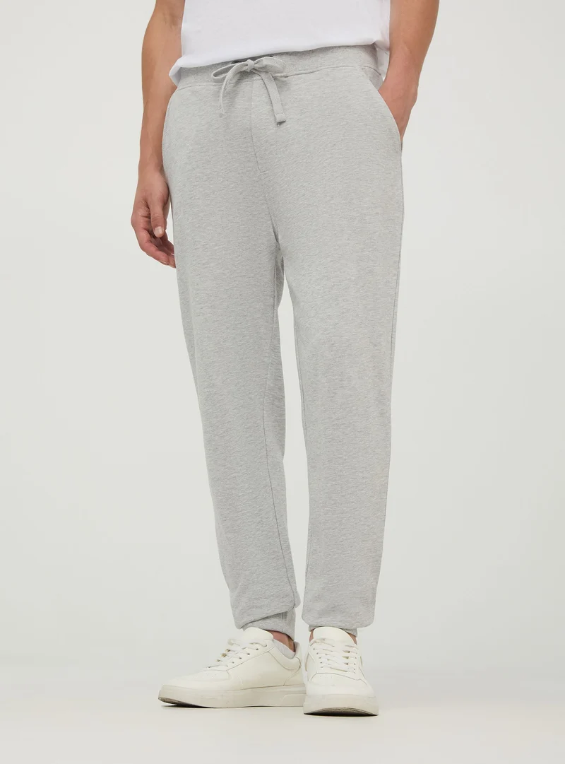 Pantaloni tuta leggeri in cotone con coulisse e tasche