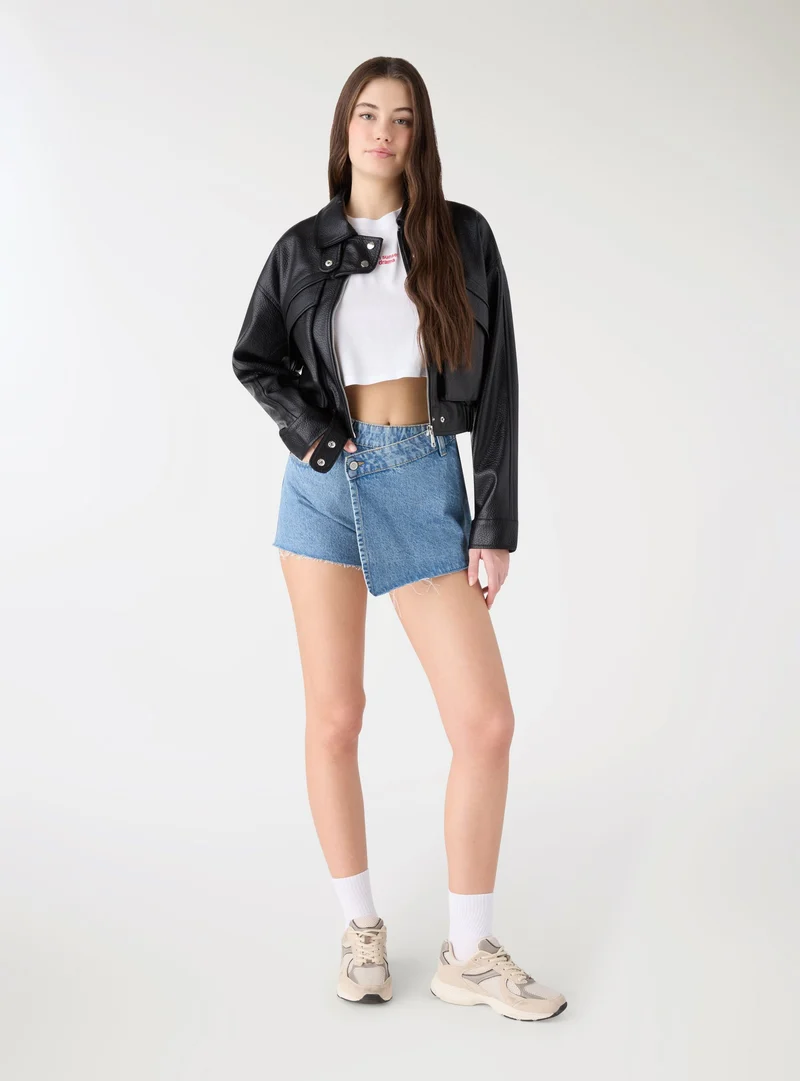 Bomber in similpelle con tasche