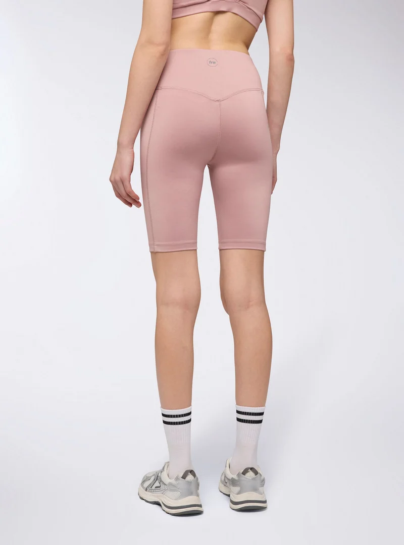 Leggings sportivi corti con tasca