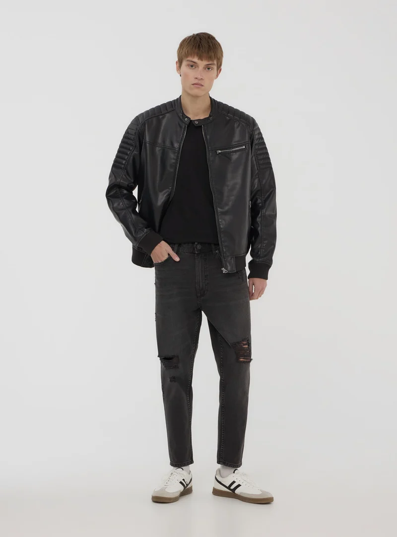 Jeans relaxed con strappi ampi