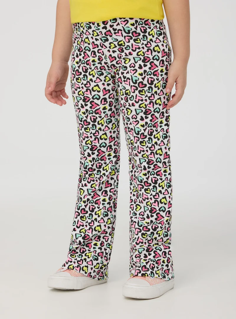 Leggings a zampa maculati a cuori multicolor