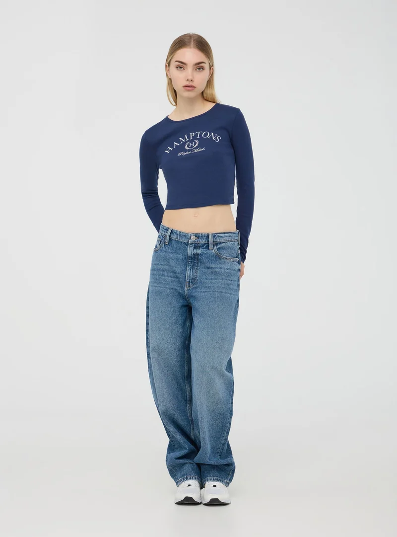 T-shirt crop stampa college