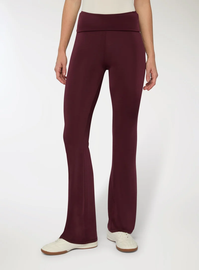 Leggings lunghi a zampa a vita alta