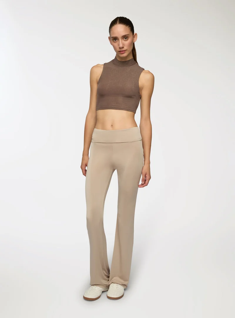 Leggings lunghi a zampa a vita alta
