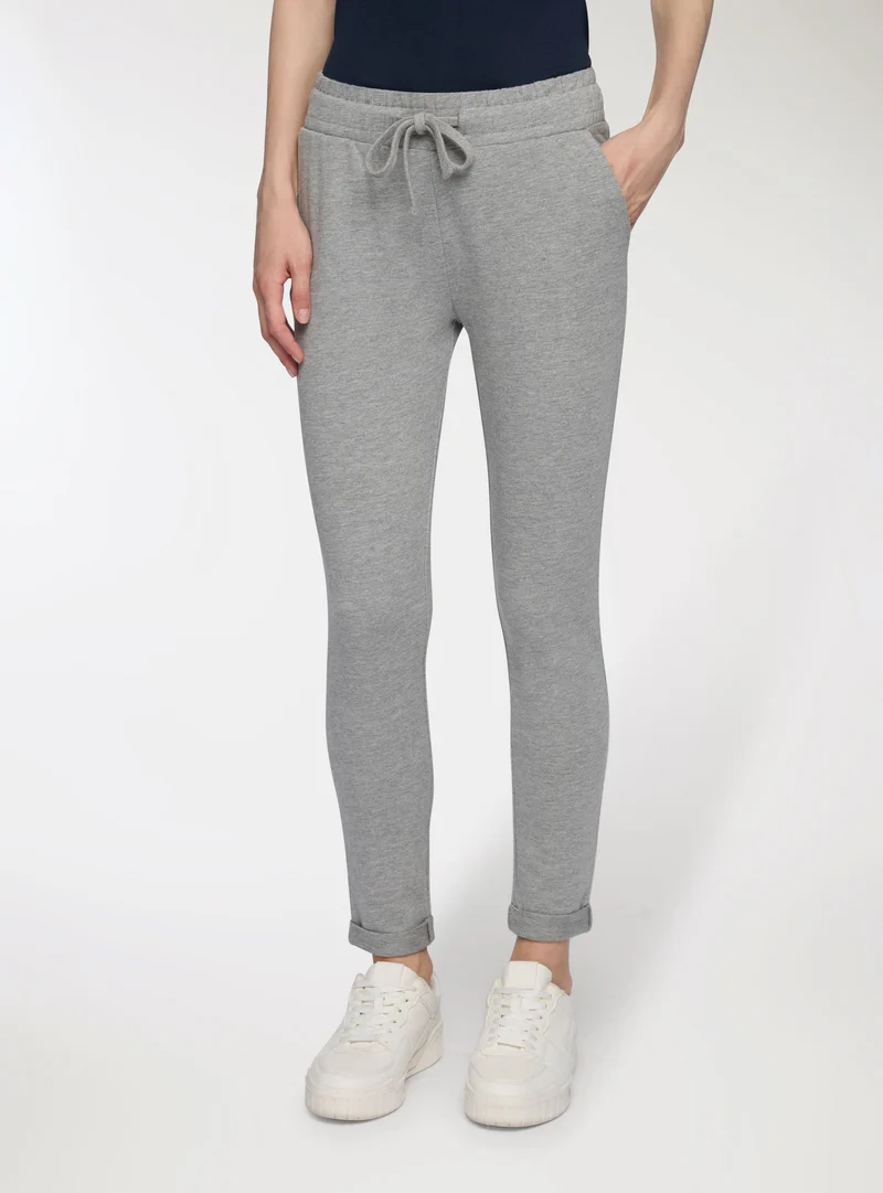 Pantaloni tuta leggeri skinny chino