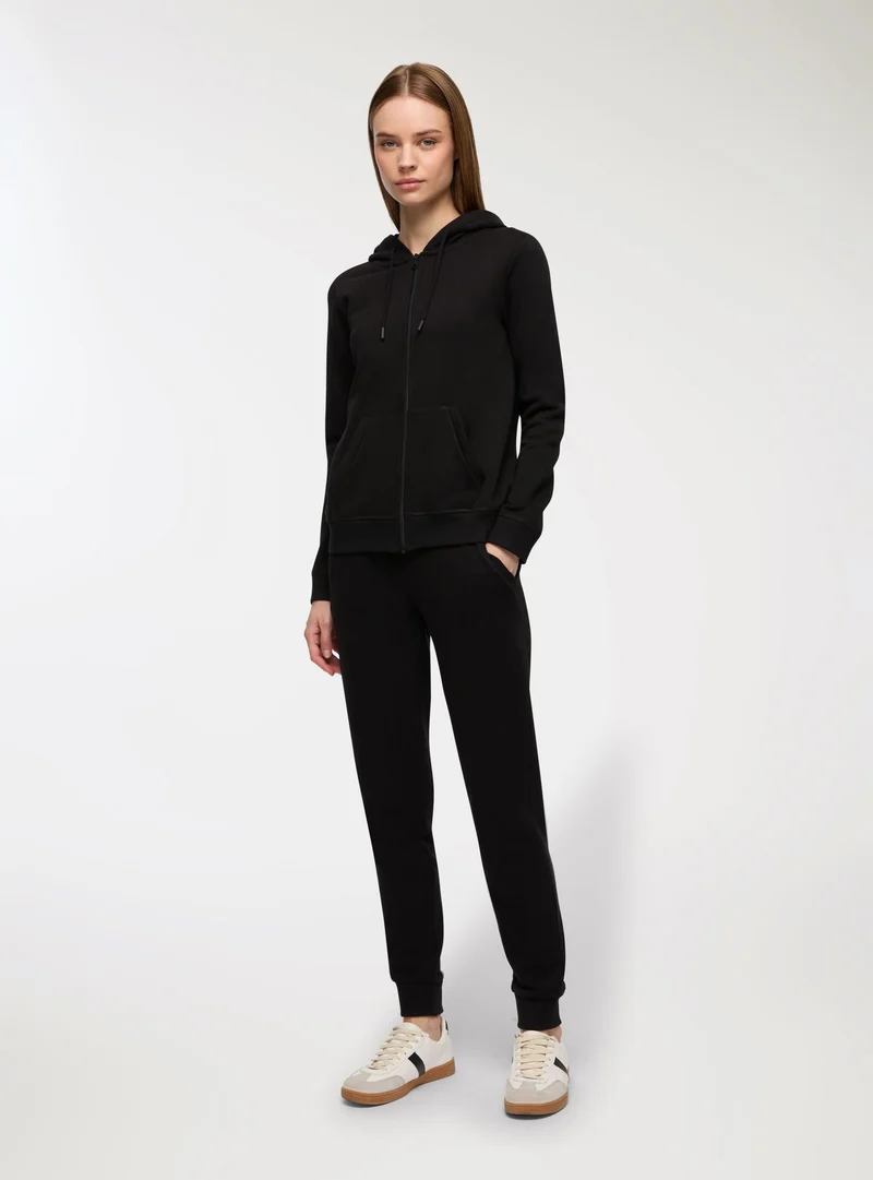 Pantaloni tuta leggeri con polsini e coulisse