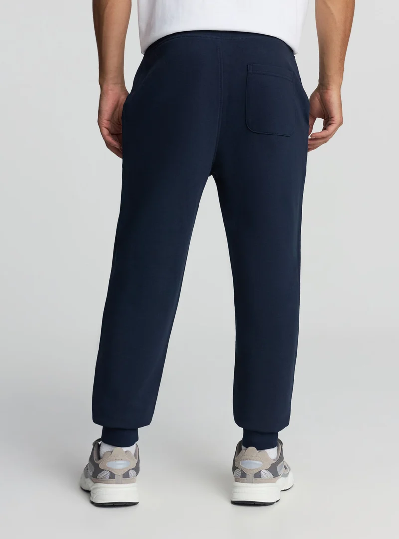 Pantaloni leggeri tuta con coulisse e tasche