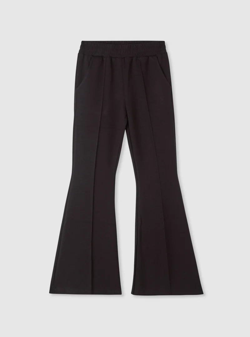 Pantaloni ginnici a zampa