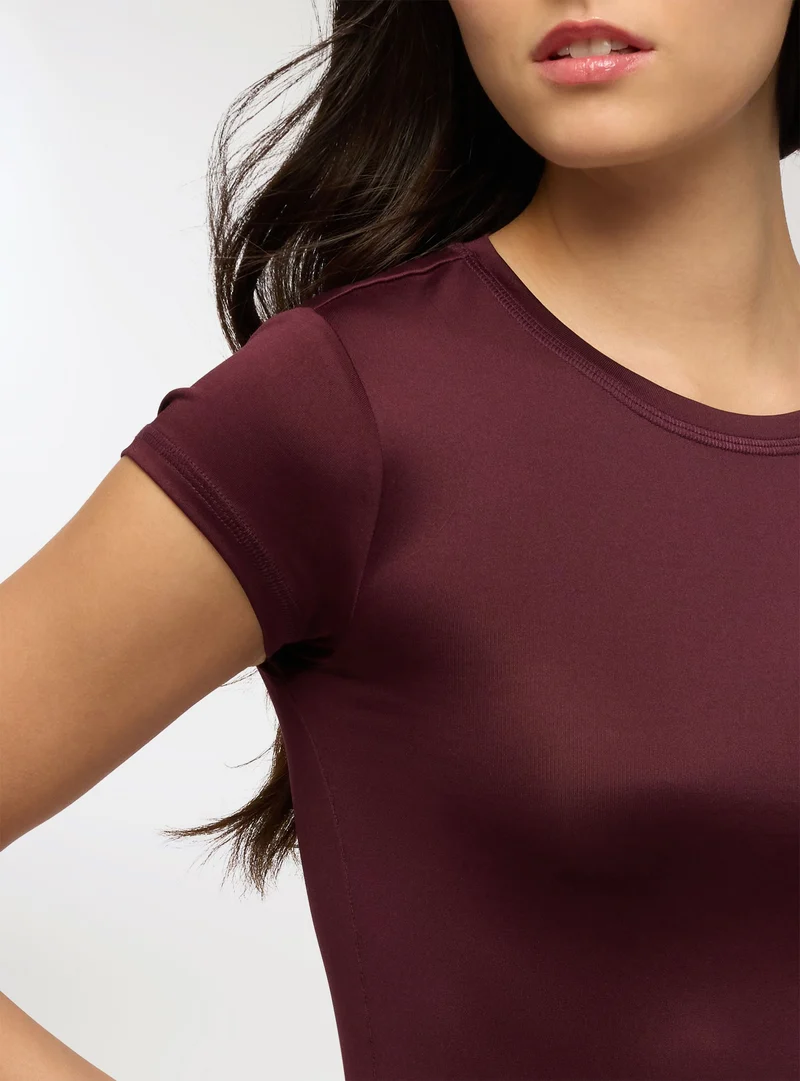 T-shirt elasticizzata tinta unita