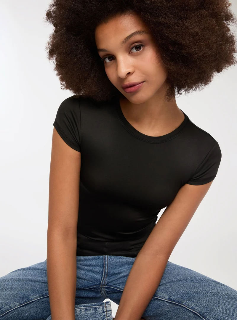 T-shirt elasticizzata tinta unita