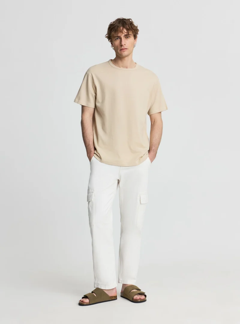 T-shirt a tinta unita con scollo tondo