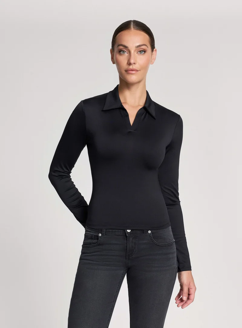 Polo elasticizzata tinta unita