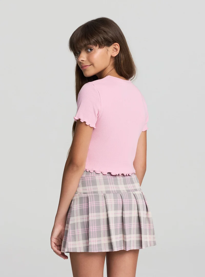 T-shirt crop con bordi ondulati