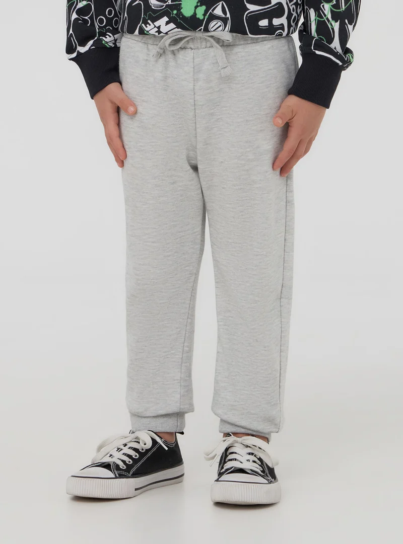 Pantaloni leggeri tuta con coulisse e tasca sul retro