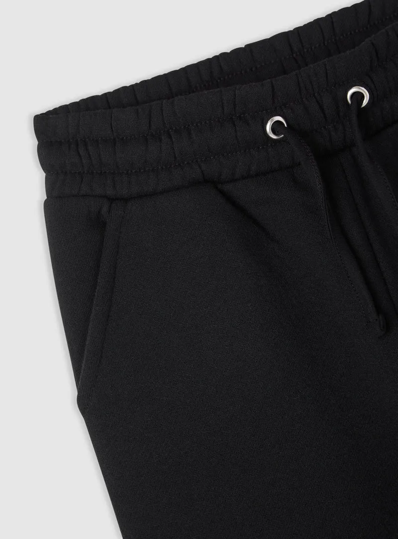 Pantaloni ginnici wide leg con stampa Kuromi®