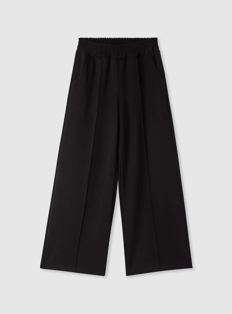 Pantaloni tuta wide leg a tinta unita