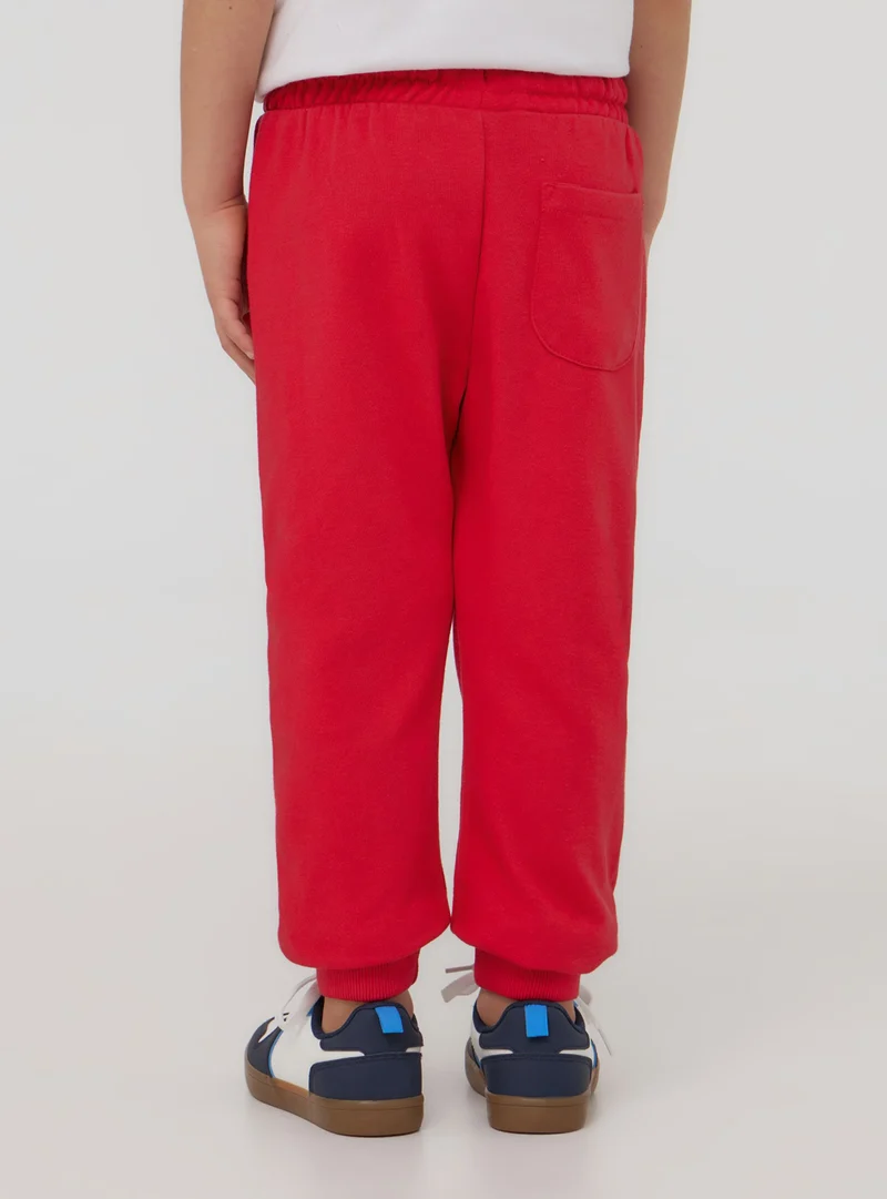 Pantaloni leggeri tuta con coulisse e tasca sul retro