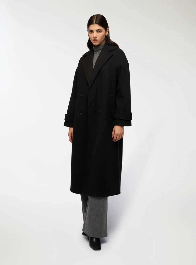 Cappotto doppiopetto lungo over