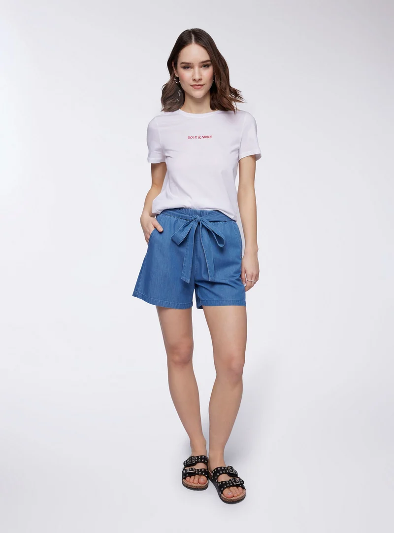 Shorts in denim chambray con fusciacca