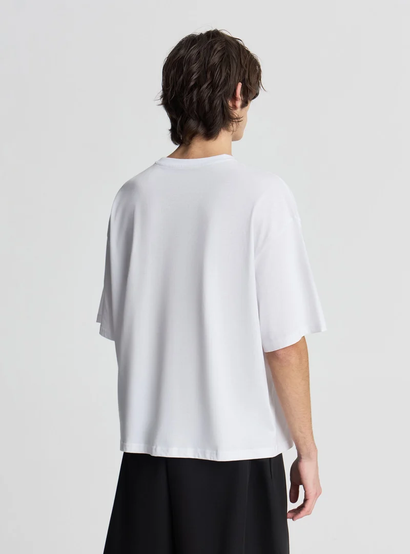 T-shirt crop a tinta unita