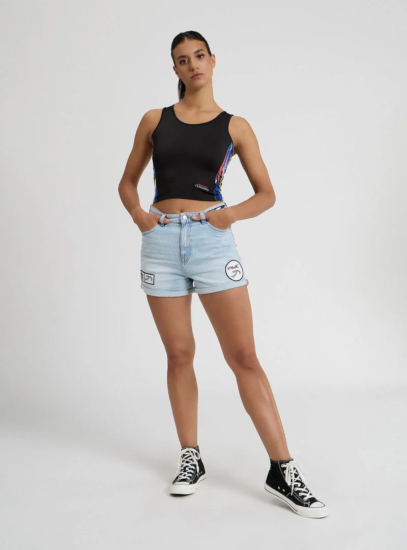 Shorts di jeans con patch MWC