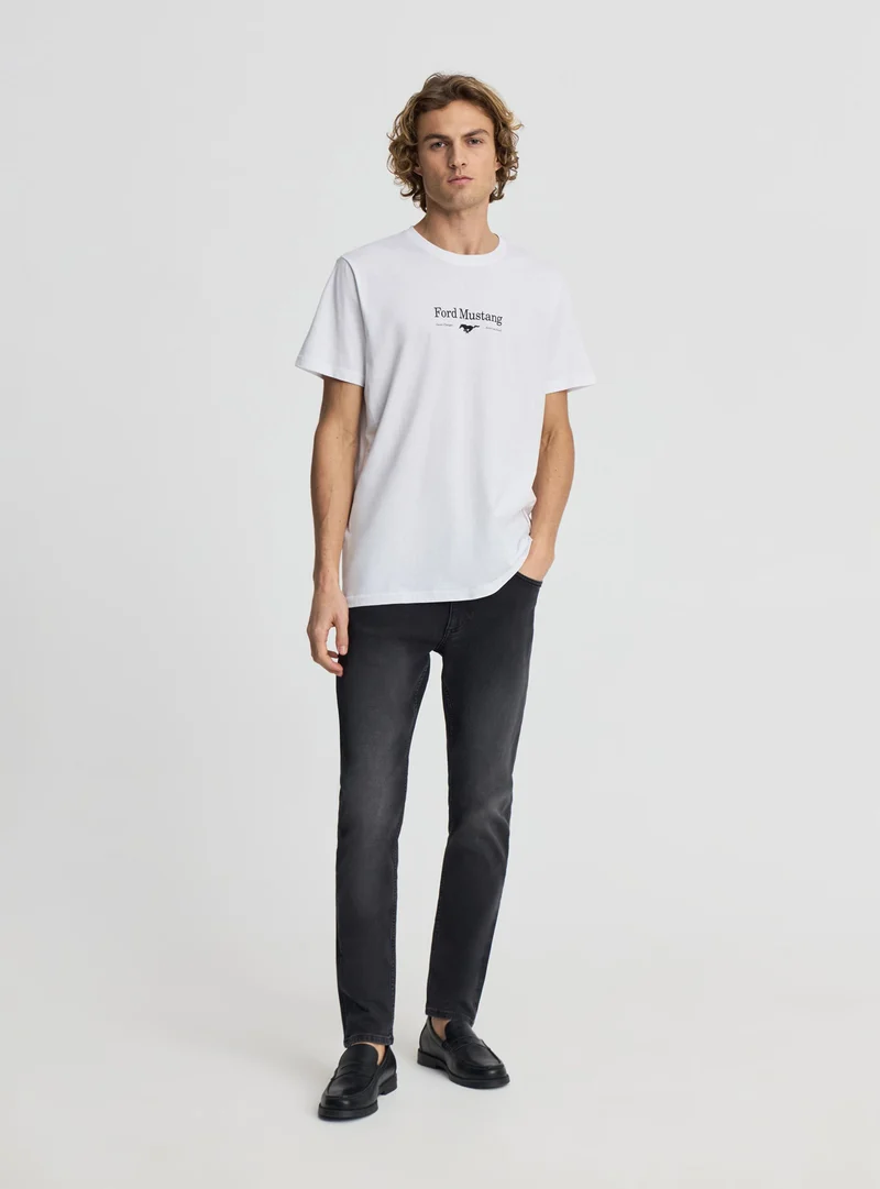 Jeans skinny a tinta unita