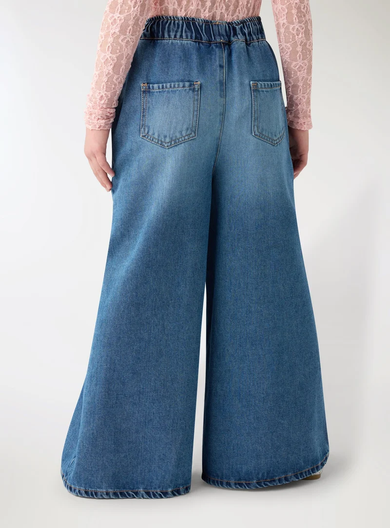 Jeans super wide leg con elastico in vita