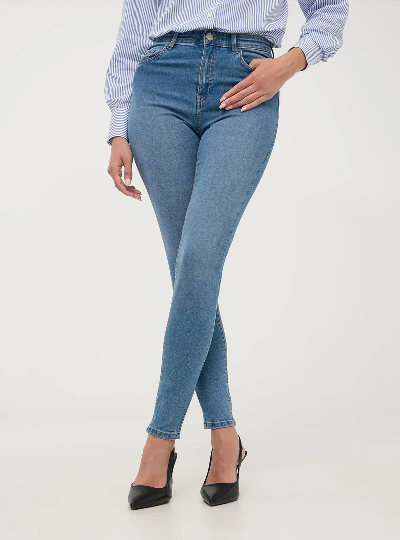 Jeans skinny a vita alta