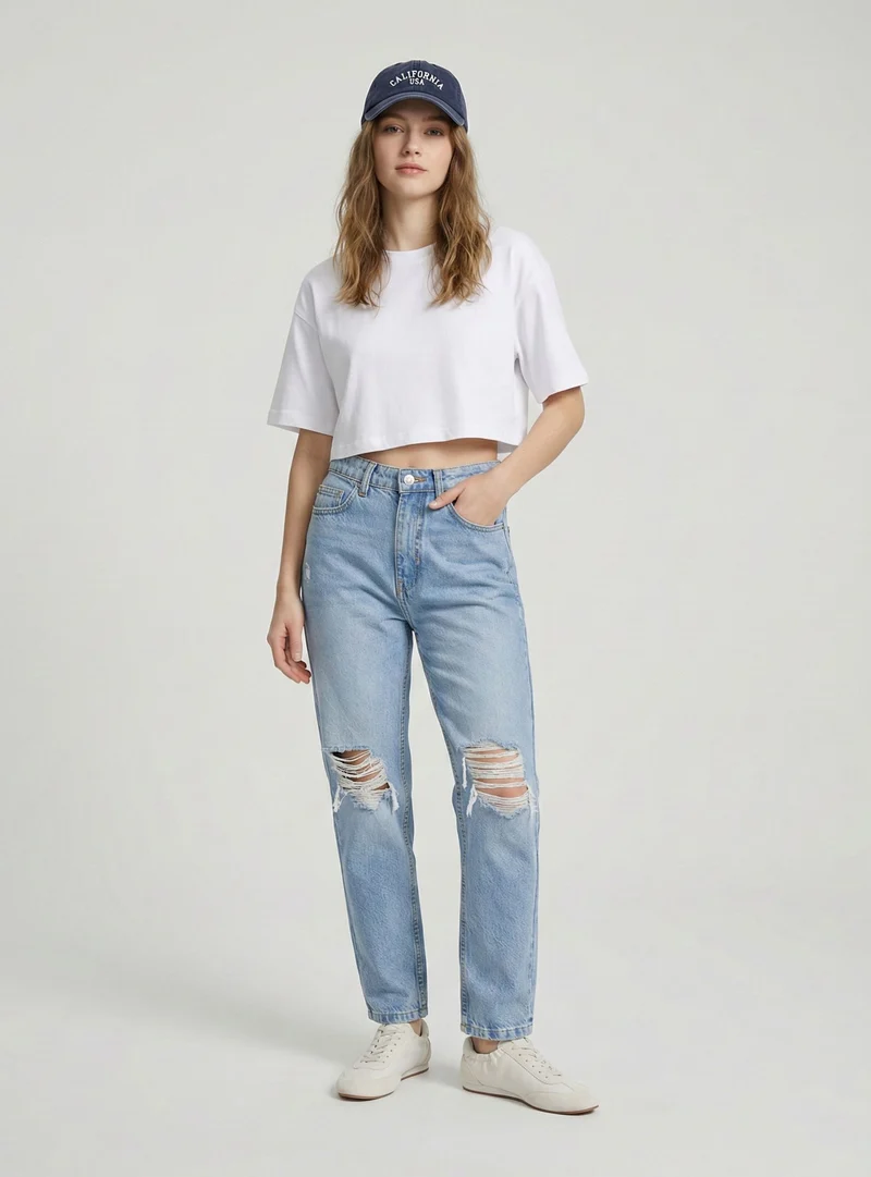 Jeans mom con strappi