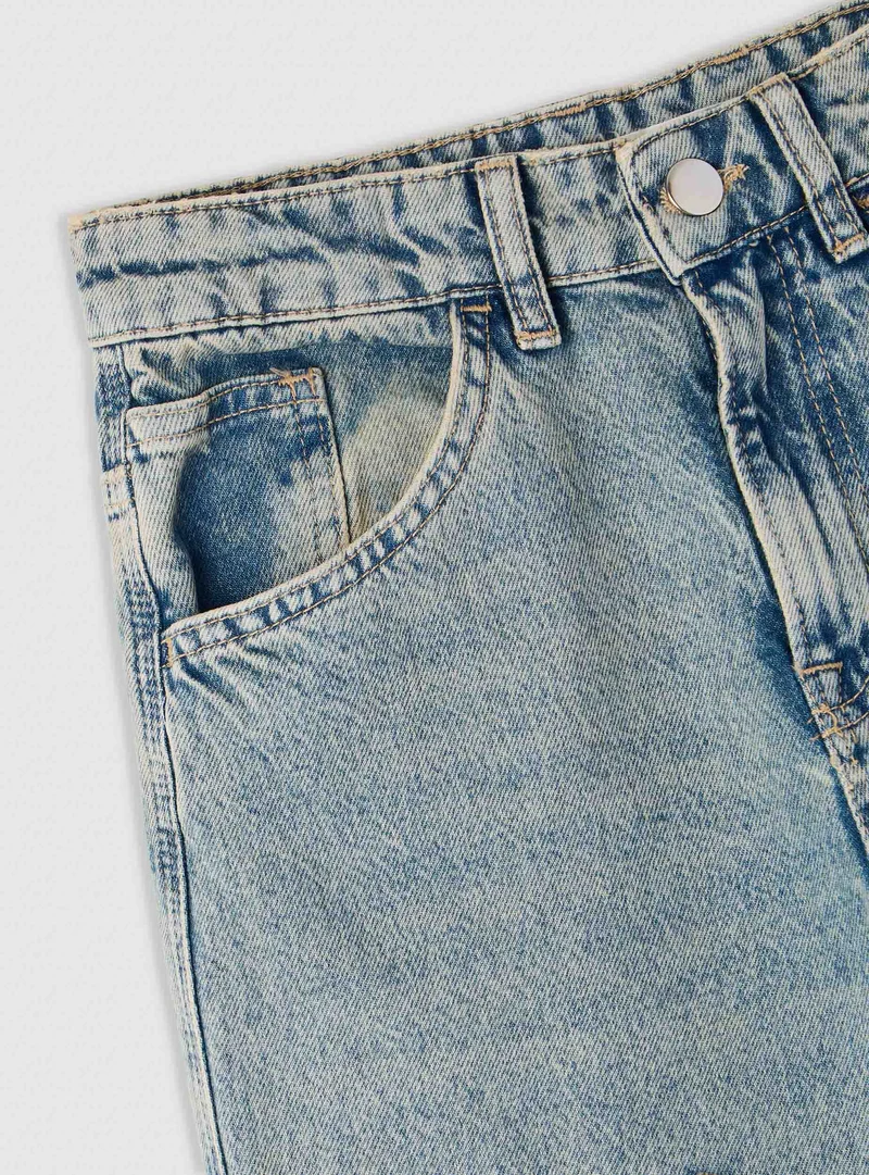 Jeans carpenter con tasche applicate