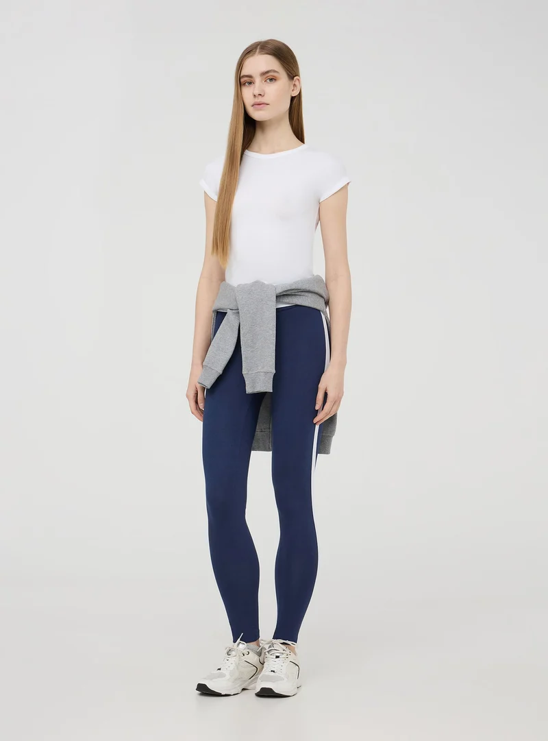 T-shirt maniche ad aletta tinta unita