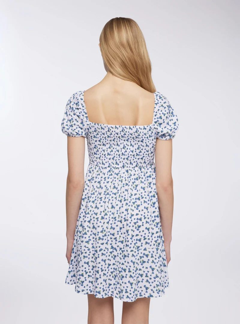 Vestito con punto smock floreale