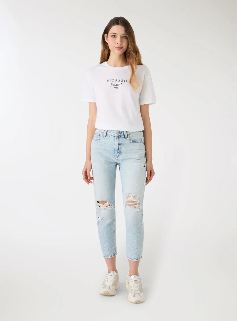Jeans mom con strappi