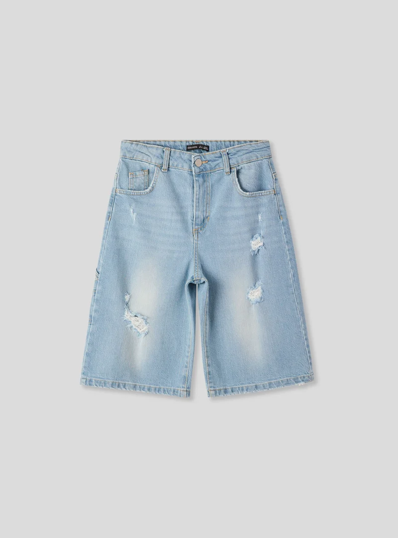 Bermuda jeans chiari carpenter con strappi