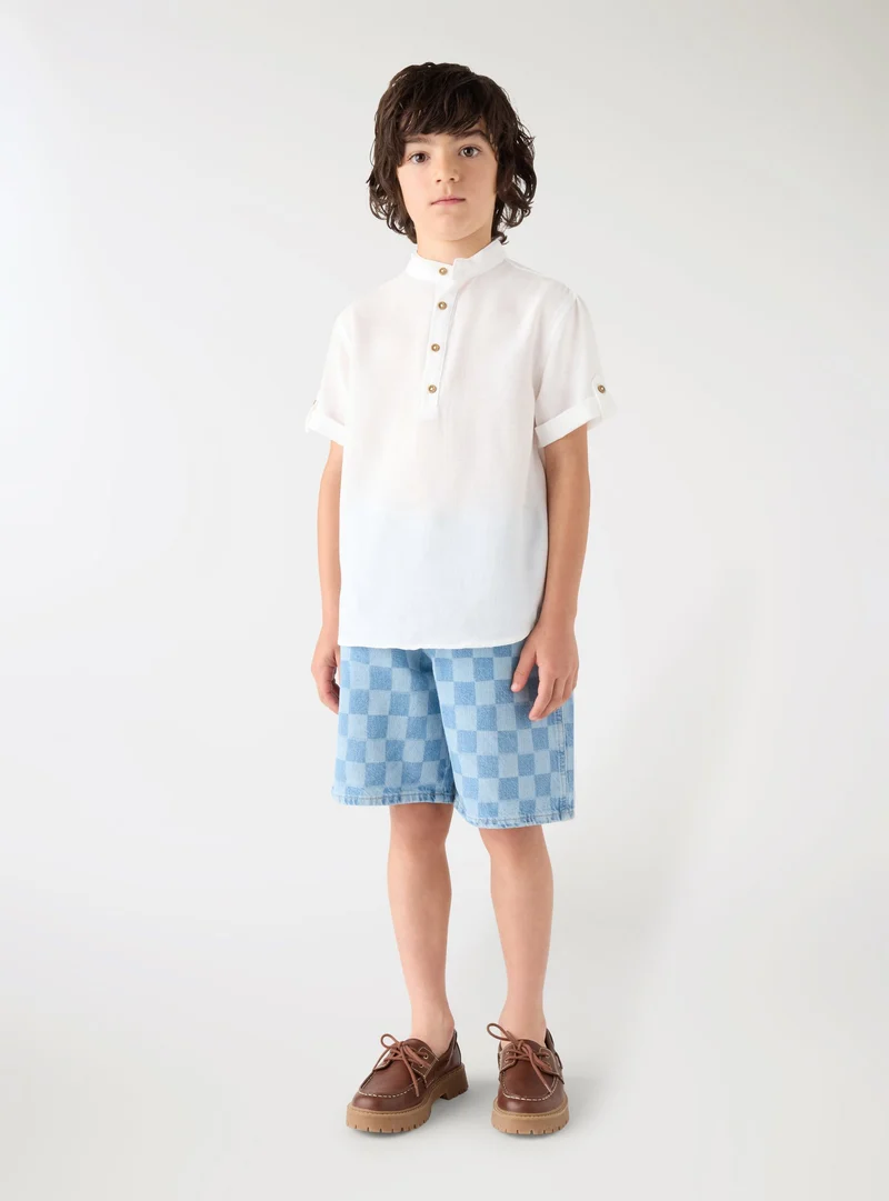 Pantaloncini jeans a quadri