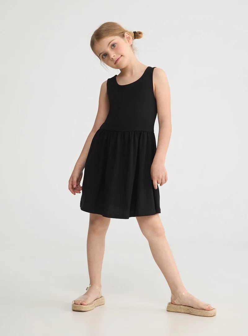 Vestito skater a tinta unita