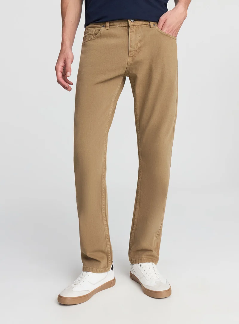 Jeans regular fit a tinta unita