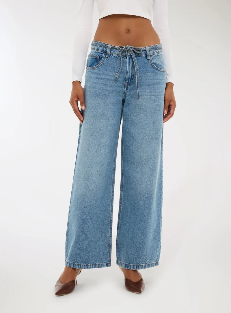 Jeans wide leg con cintura