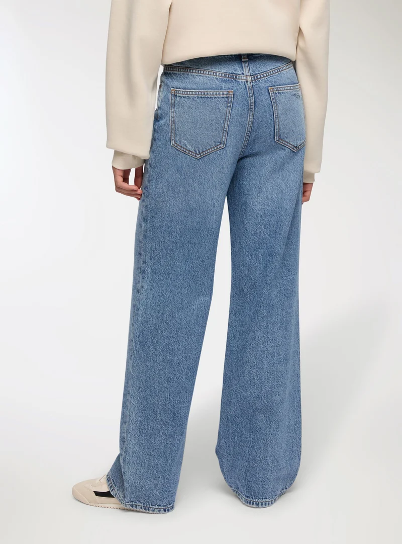 Jeans wide leg con strappi