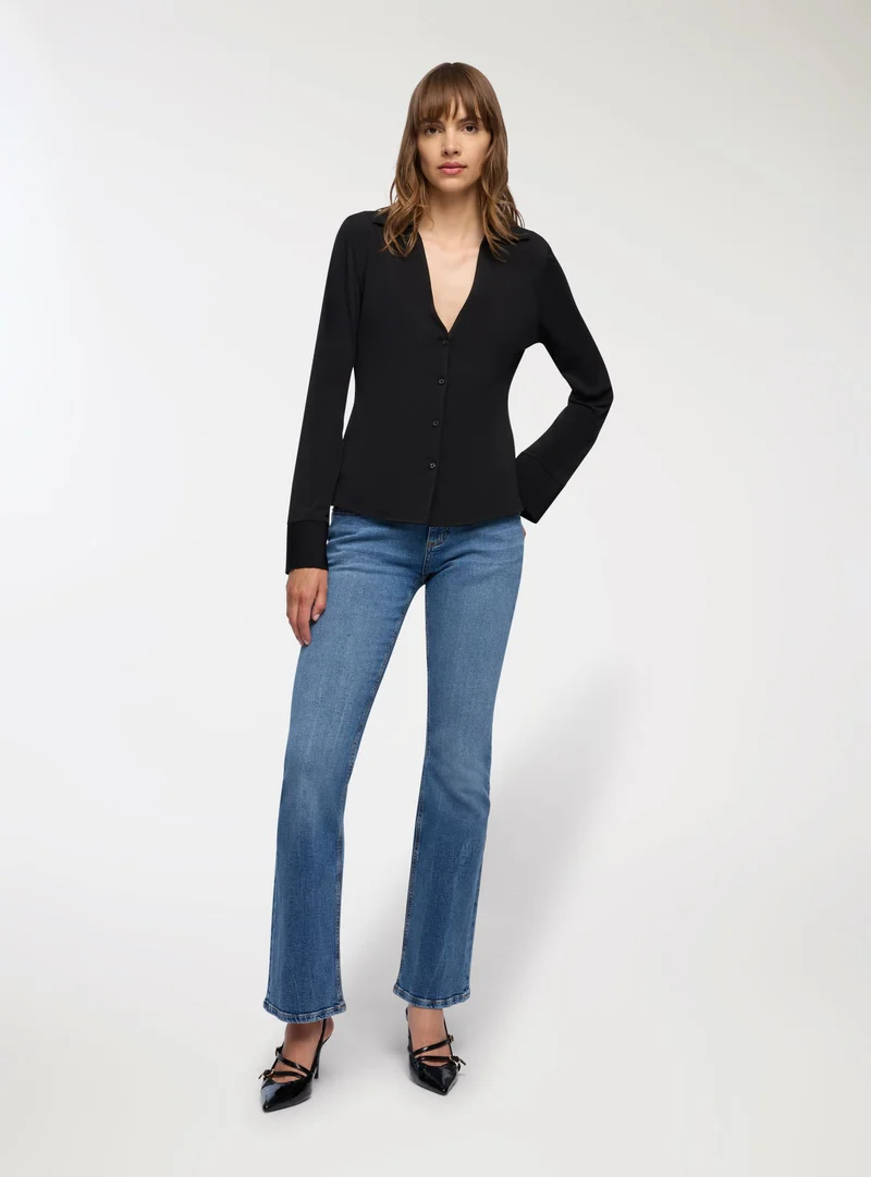 Jeans a zampa vita bassa
