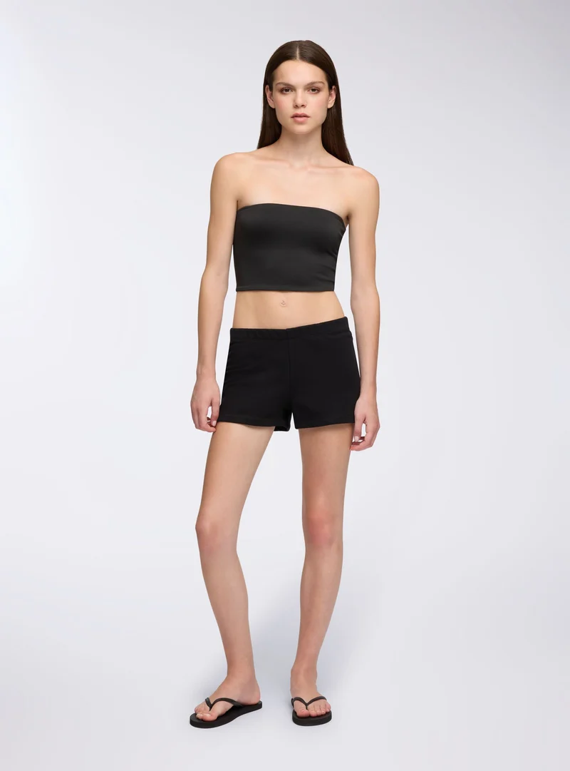 Shorts tuta a vita alta