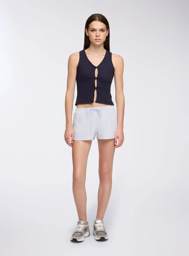 Shorts a righe a vita bassa